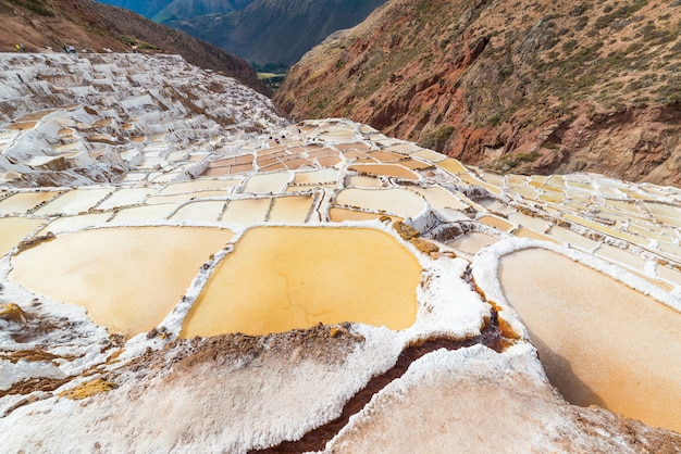 Glowing white salt pans on the Peruvian Andes