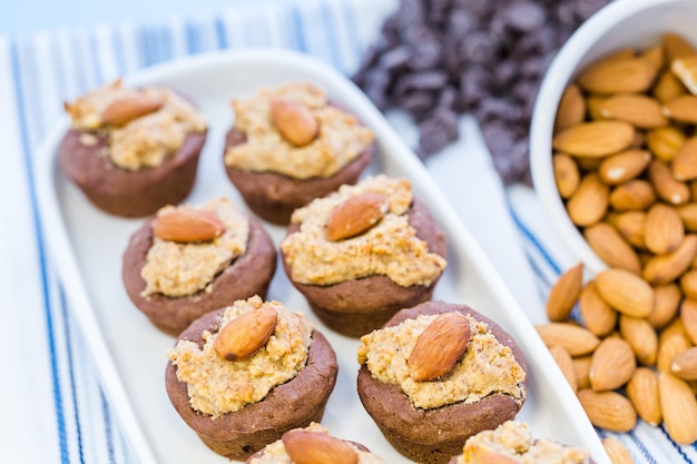 Gluten free chocolate baked snacks with peanut butter and whole almond.