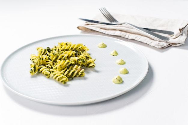 Gluten-free pasta with spinach. Diet dish. 