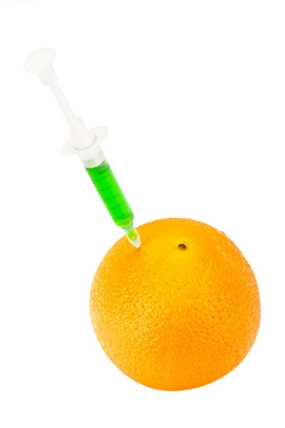 GMO orange with syringe on the white