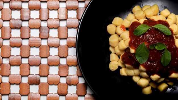 Gnocchi di patata, italian potato noodle with tomato sauce and basil