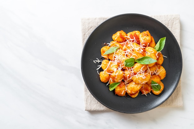 gnocchi in tomato sauce with cheese