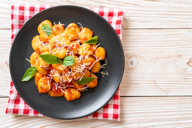 gnocchi in tomato sauce with cheese