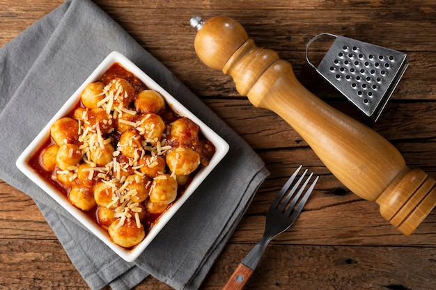 Gnocchi with tomato sauce and grated Parmesan cheese