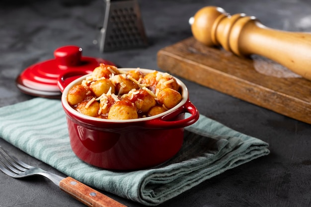 Gnocchi with tomato sauce and grated Parmesan cheese