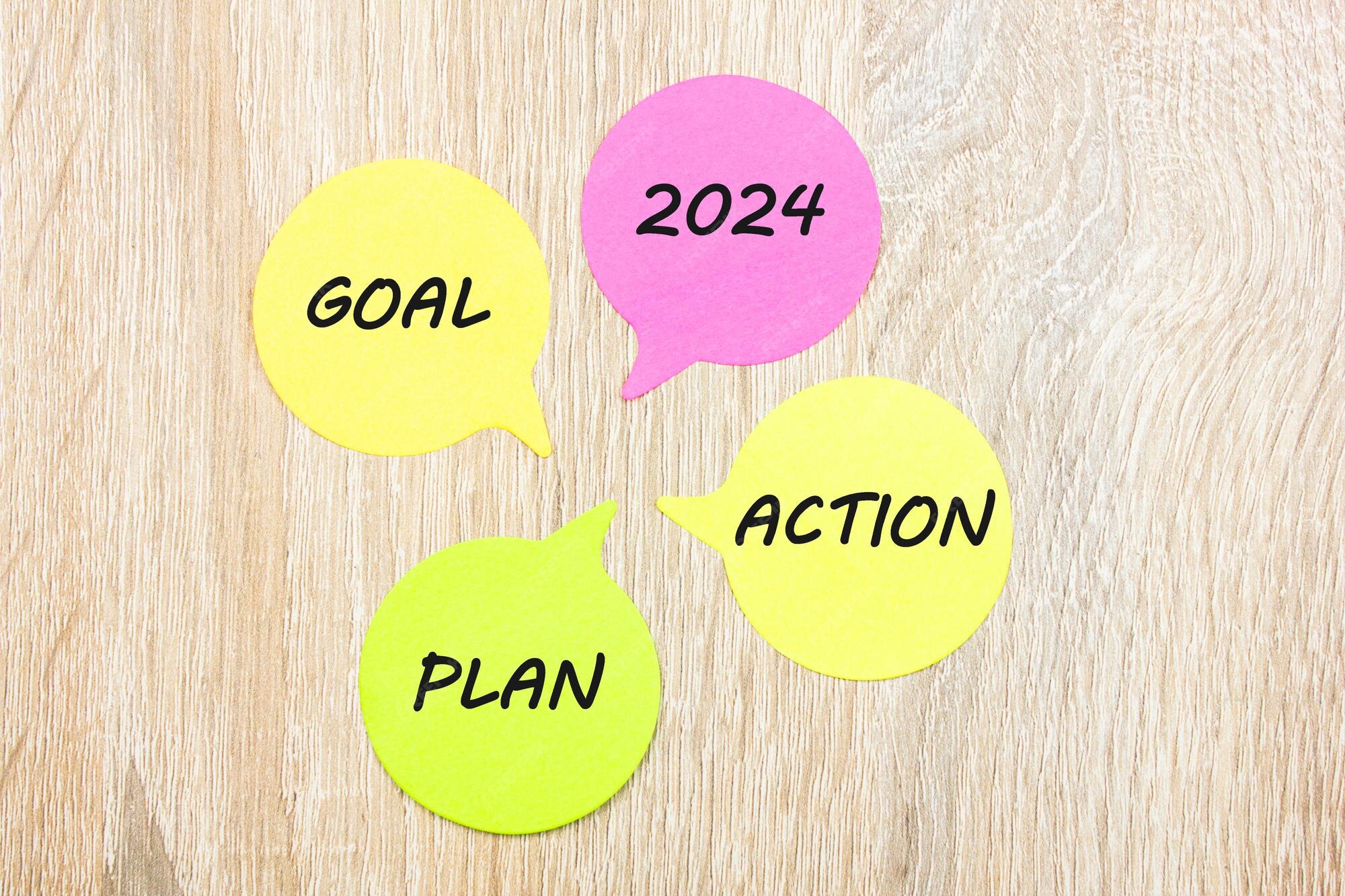 Premium Photo Goal plan action 2024 text acronym on bright stickers