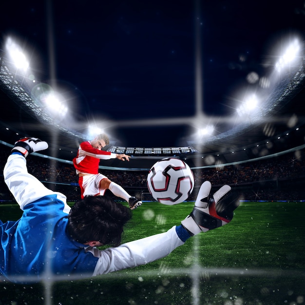 Foto il portiere prende la palla nello stadio durante una partita di calcio
