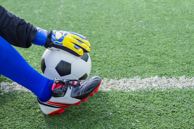 Goalkeeper protection soccer ball into the goal