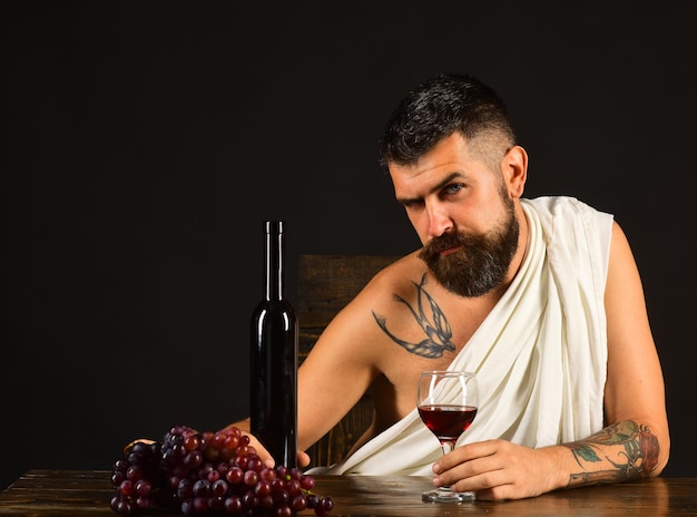 God of wine with tricky face wearing white cloth