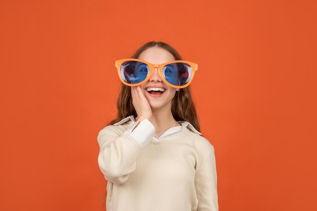 Going crazy childhood happiness fancy party look happy funny kid in glamour eyeglasses