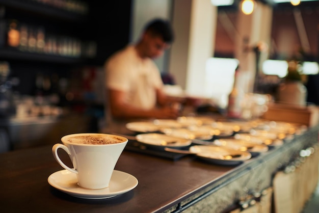 Going out to make a customer happy Shot of a freshly brewed cup of coffee standing on a table by its own inside of a restaurant during the day