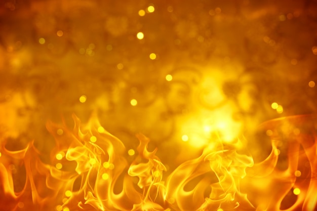 Gold abstract bokeh with flame for background.