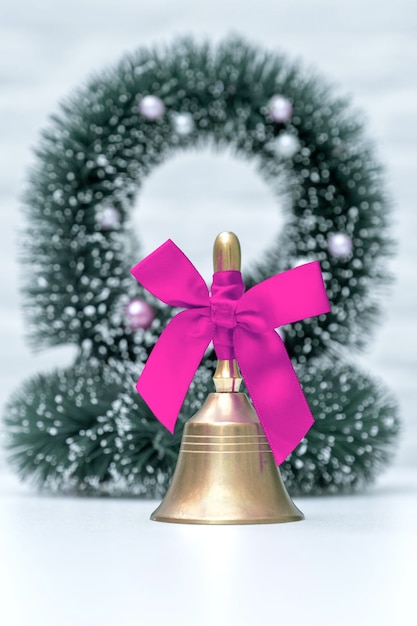 Gold bell pink purple violet white background bow ribbon Christmas tree toy New Year