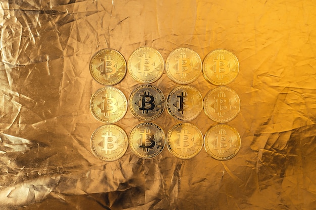 Gold bitcoin on gold background,bitcoin coins stacked