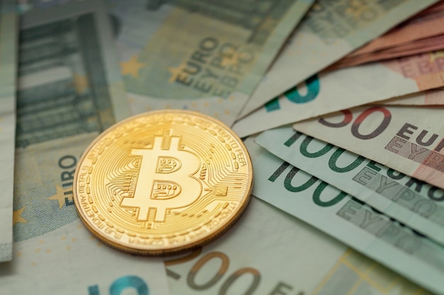 Gold bitcoin lies on euro