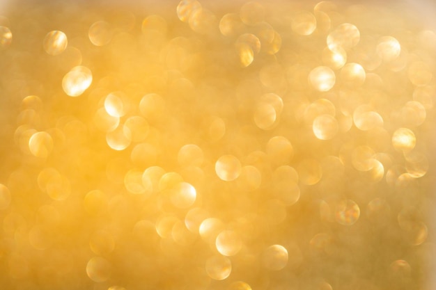 Gold bokeh and defocused background with copy space