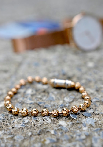 gold bracelet close up Gold balls