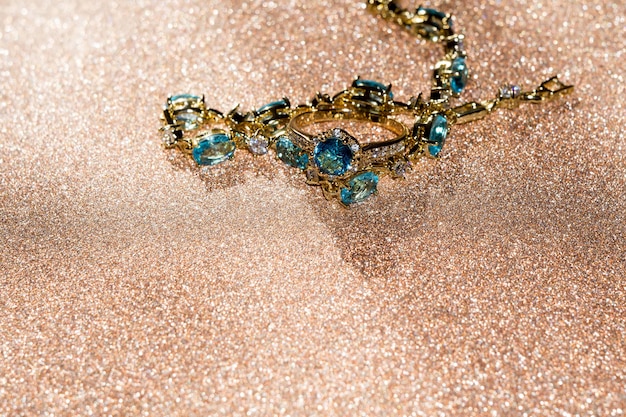 Photo gold bracelet with blue topaz