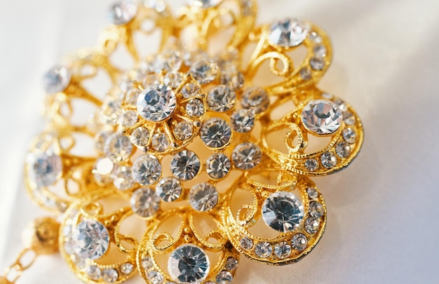 A gold brooch with diamonds and diamonds