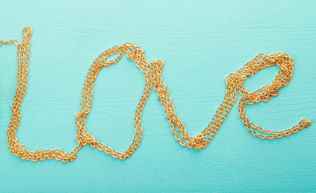 Photo gold chain. the word love.