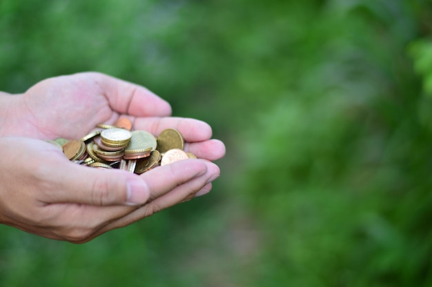 Photo gold coin on hand