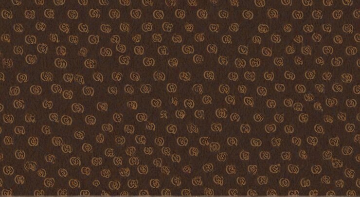 Photo gold coins on a brown background