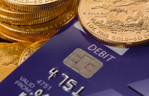 Gold coins on chip and pin debit card