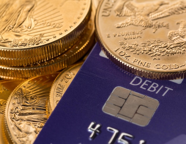 Gold coins on chip and pin debit card