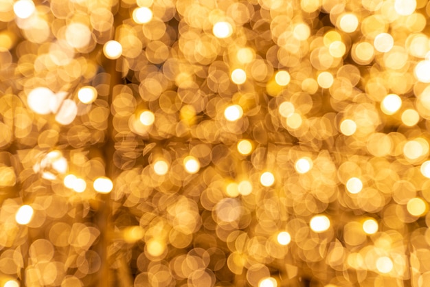 Foto priorità bassa del bokeh di colore oro