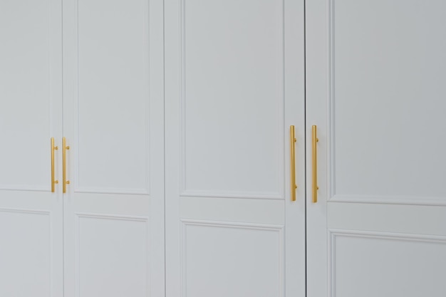 The gold color of the builtin cabinet handles gives it a luxurious feel