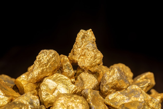 Gold concept, close-up of large gold nuggets