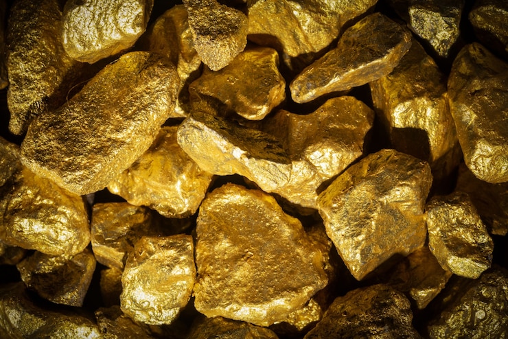 Photo 金のコンセプト、大きな金塊のクローズアップ