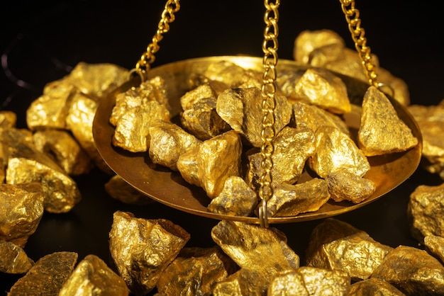 Gold concept, close-up of large gold nuggets