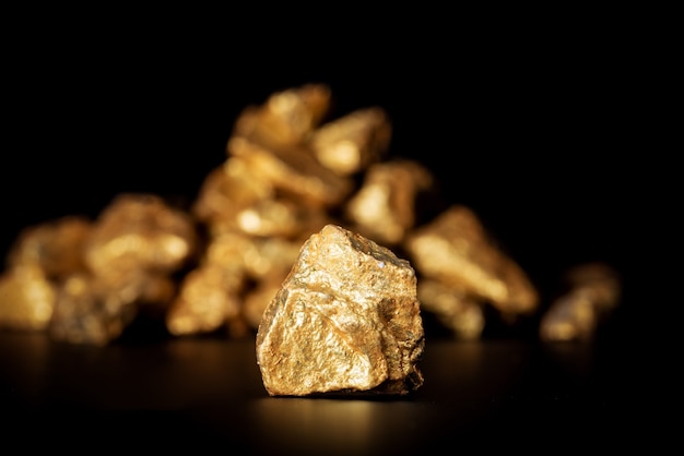 Gold concept, close-up of large gold nuggets