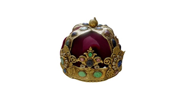 Photo a gold crown with a stone on the top.