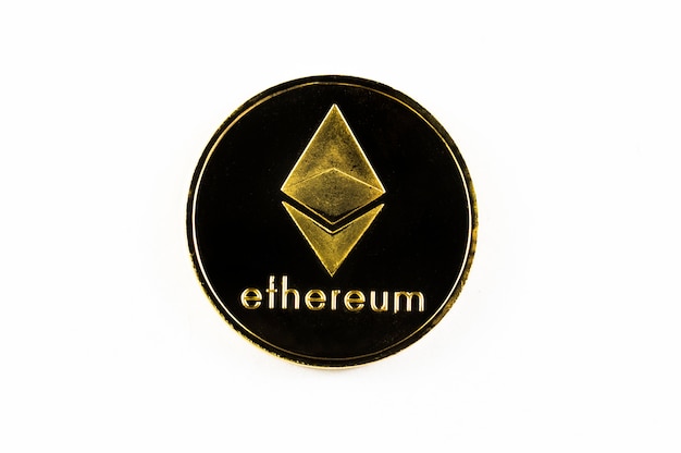 Gold ethereum coin isolated on white background