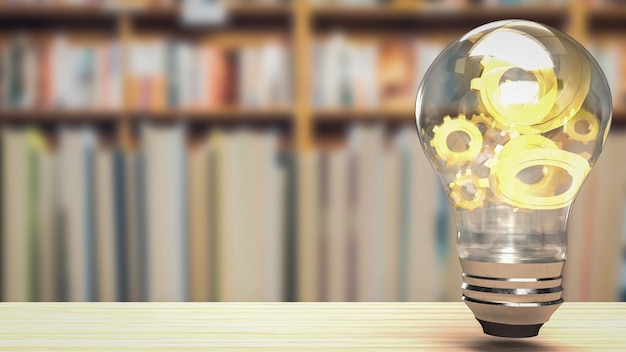 The gold gear in lightbulb for education or creative concept 3d rendering