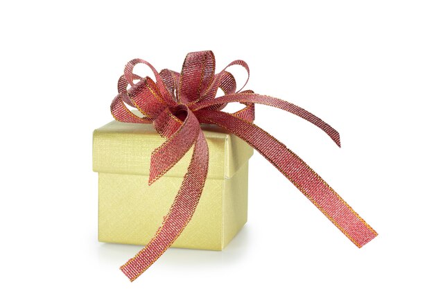 Gold gift box with red ribbon