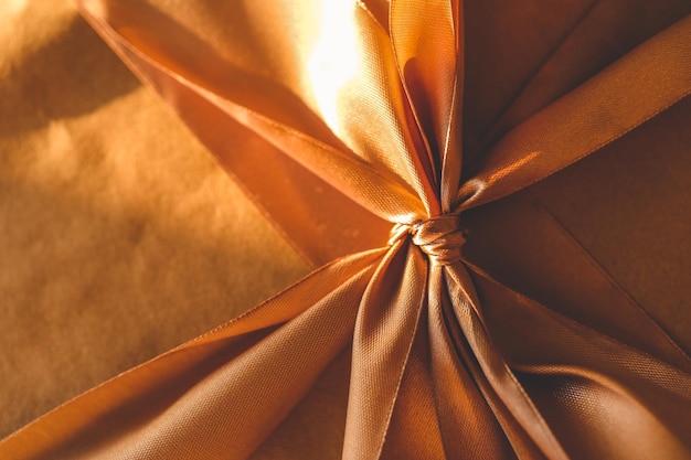 Gold gift wrapping closeup bow