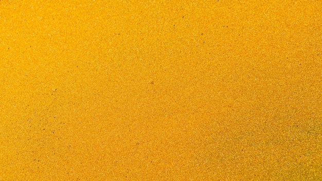 Gold glitter abstract background. Golden textured surface. Minimalism