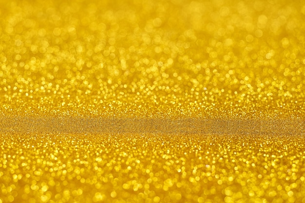 Gold glitter Christmas abstract background, with copy space for text.