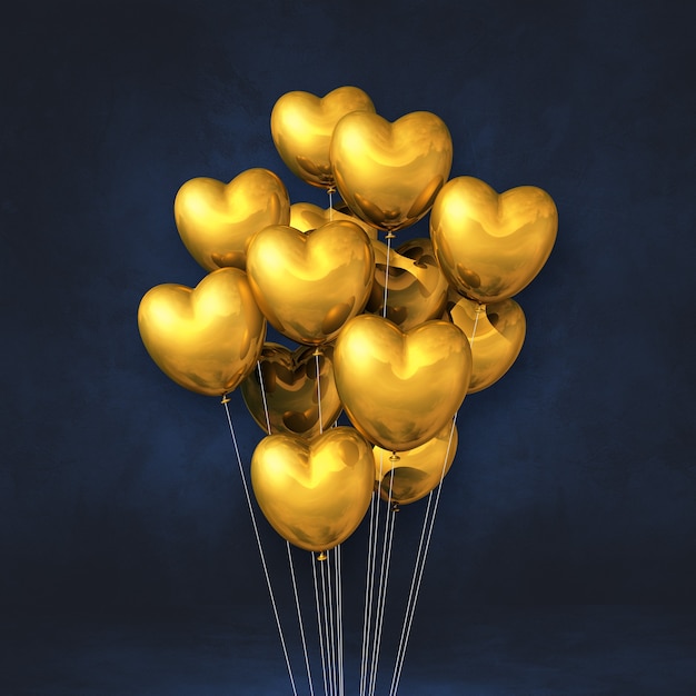 Gold heart shape balloons bunch on a black surface