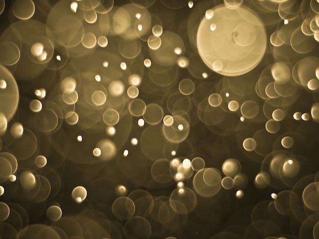 Foto fondo astratto del bokeh della luce dell'oro