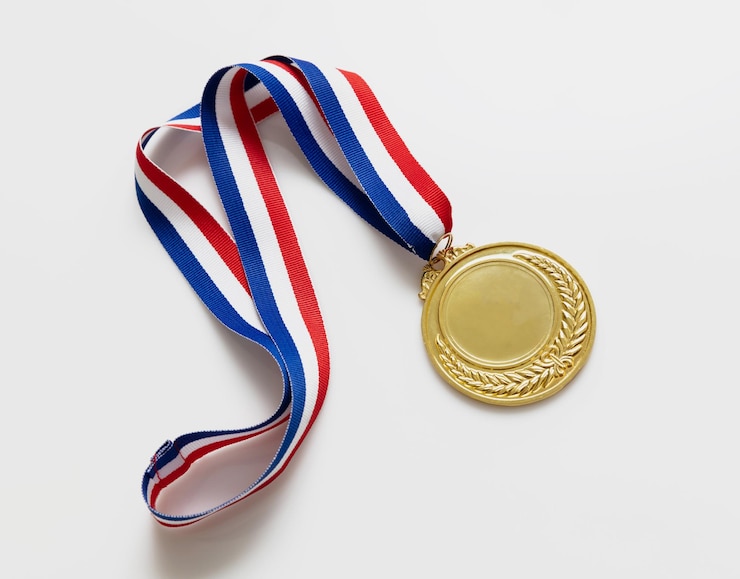 Photo gold medal champion trophy award and ribbon prize in sport for