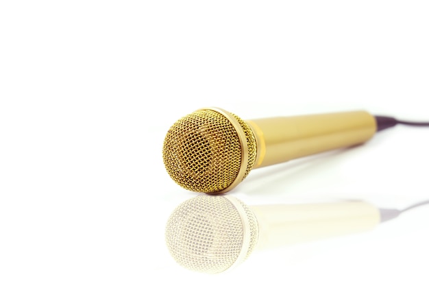 Gold Microphone on isolated white