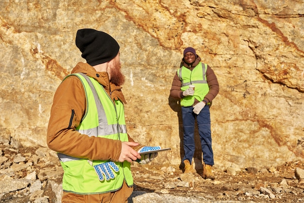 Photo gold miners inspecting worksite