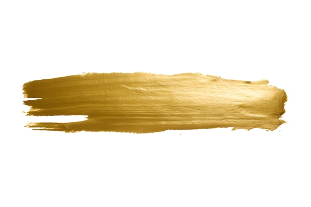 Gold paint brush strokes with glitter texture Gold stains liquid isolated on a white background