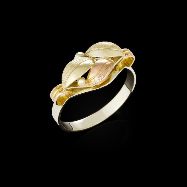 Gold ring on black background