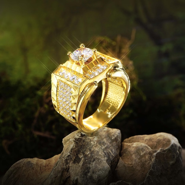 Gold ring men with diamonds, cubic Zirconia, emeralds, and precious stones on background rock moss