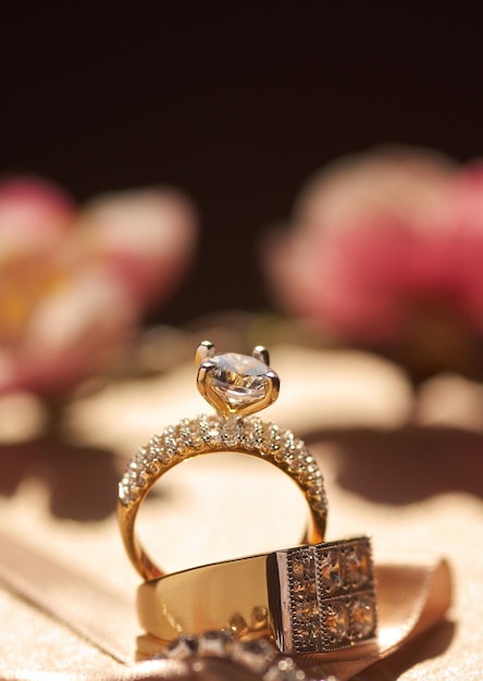 A gold ring with a diamond on it